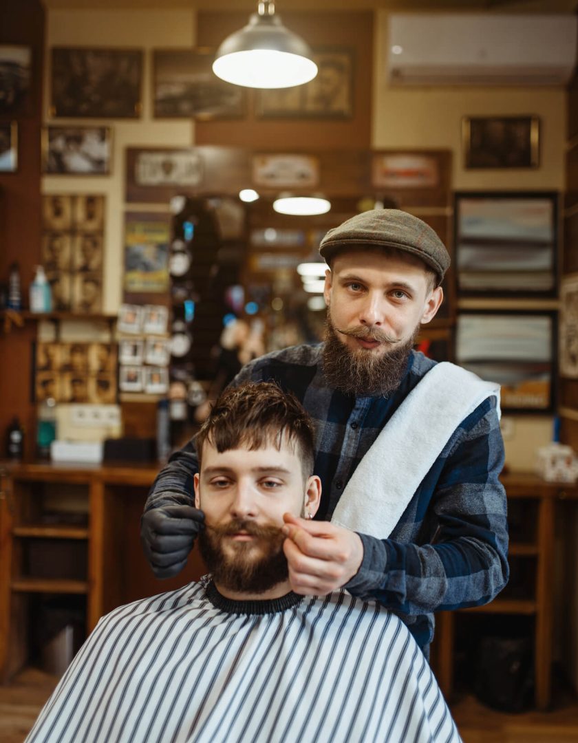 barber-and-customer-with-a-mustache-barbershop-2021-08-27-17-08-47-utc.jpg